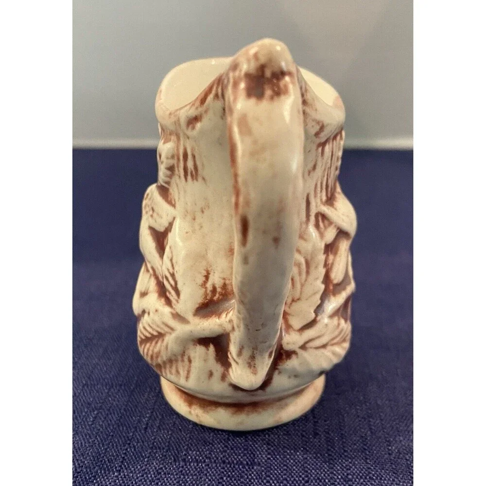 1970’S - Miniature Ceramic burgundy & Cream Embossed Flowers Water Pitcher Decor